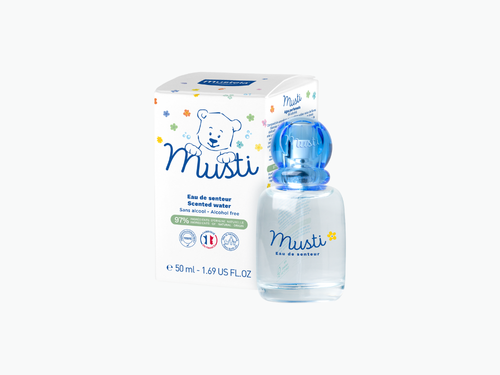 Caja del agua perfumada de Mustela y a su derecha el bote de cristal. - Mustela España - 4