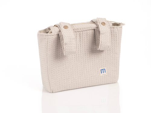 Bolsa de carrito de Mustela en tono beige con dos cintas que se sujetan al cochecito y se abrochan con botón de click. - Mustela España - 7